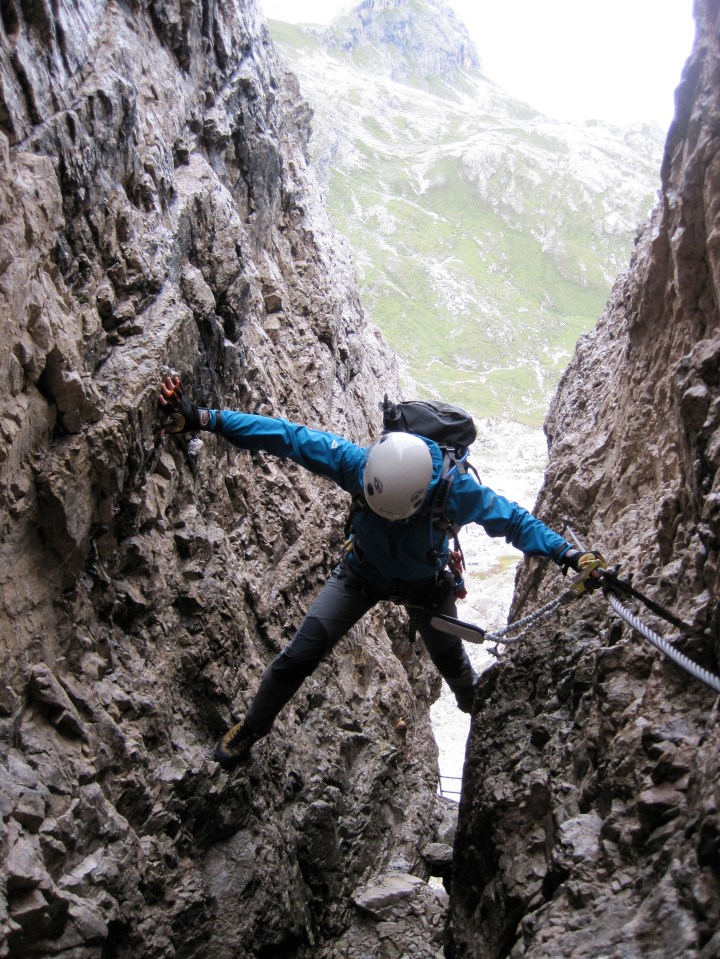 Valerie climbing the crux on the Via Ferrata Delle Scalette.