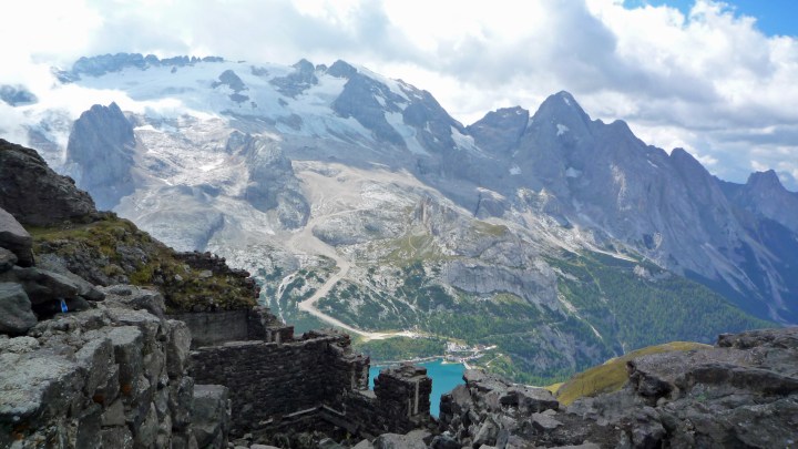 WW1 ruins and a view of Marmolada from the Via delle Trincee.