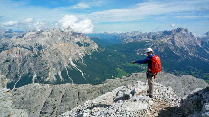 Working out the route on the descent from Tofana di Dentro in the Dolomites, Italy.