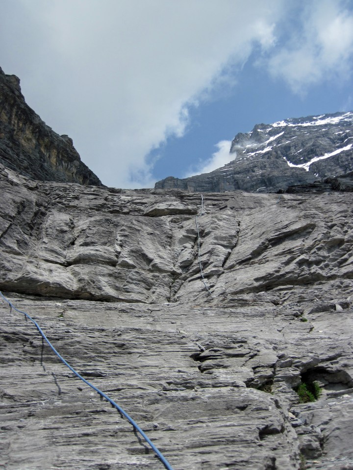 The descent route from the Rotstock, with some of the fixed ropes and the west face of the Eiger.