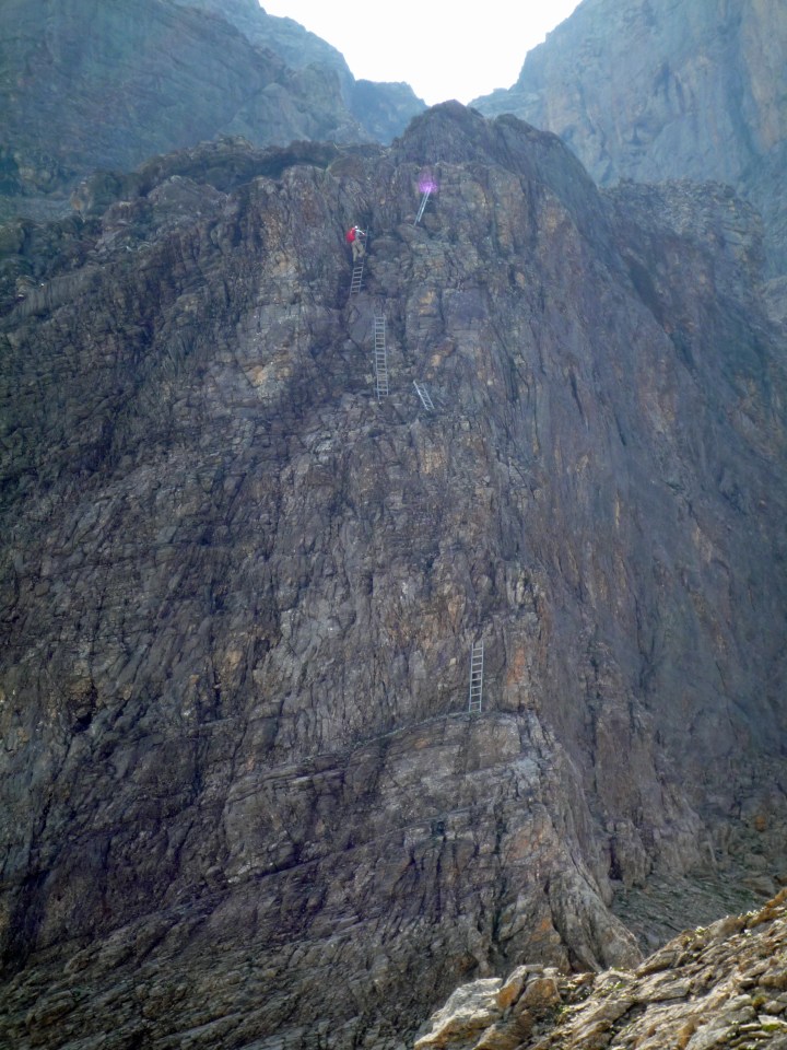 Me climbing the ladders  on the Rotstock Via Ferrata.