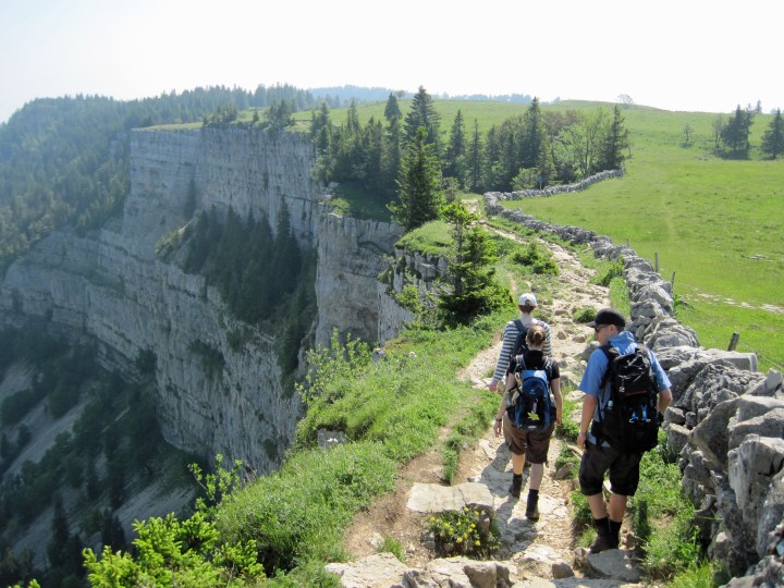 Valerie, Wanda and Marc walking along the edge of the Creux du Van.
