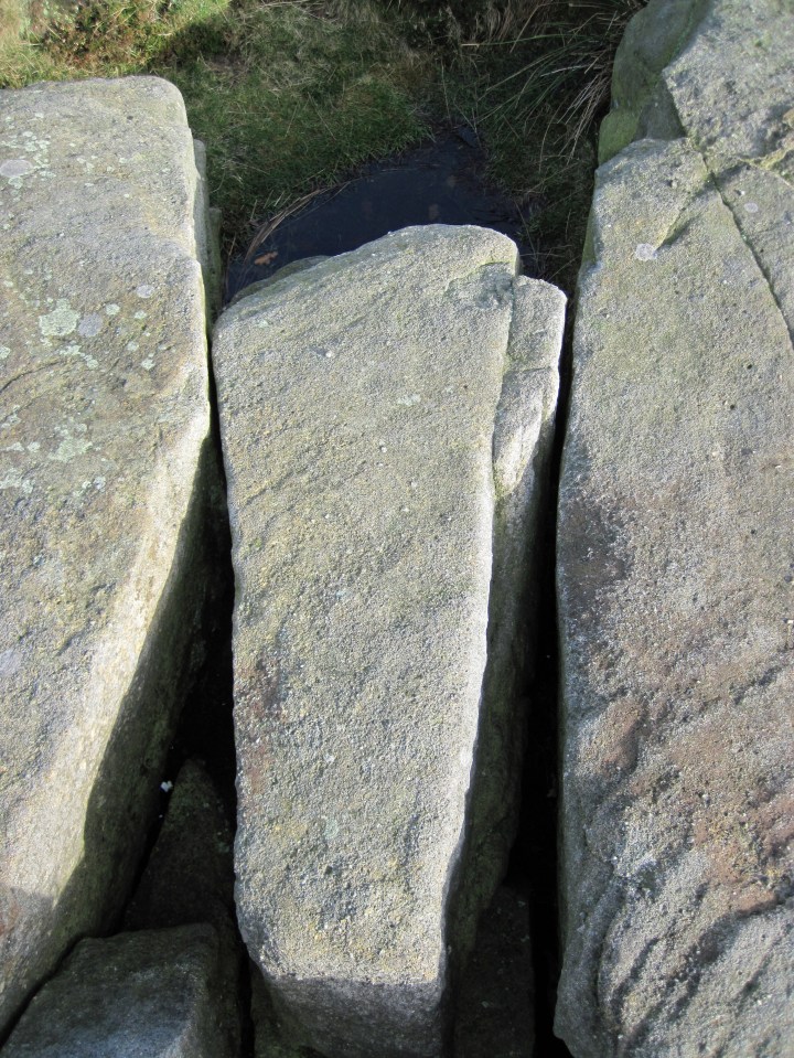 The wobbly rock that might make for some wobbly anchors at the top of Wobblestone Crack.