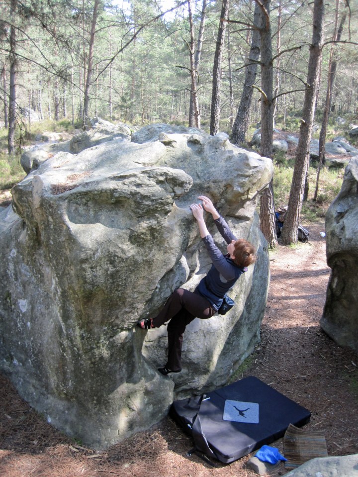 Valerie climbing problem number 1 at Rocher des Potets.