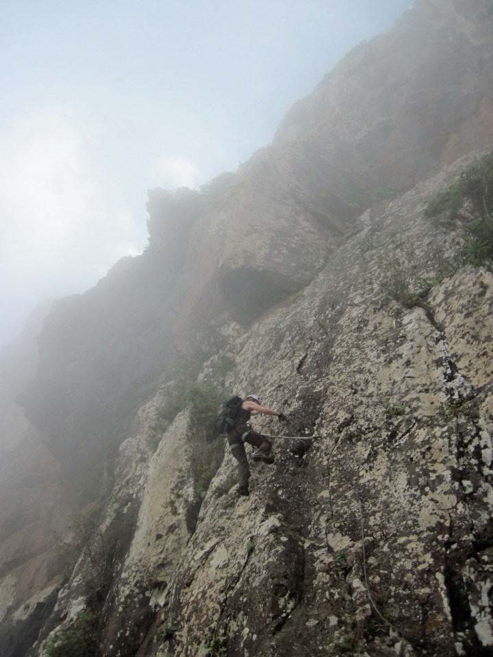 Valerie climbing the Via Ferrata La Guagua on Gran Canaria in the Canary Islands.