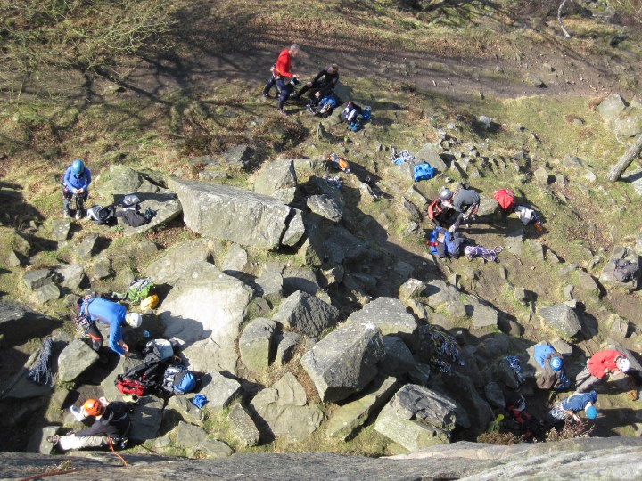 Rock climbers at the bottom of Froggatt Edge.