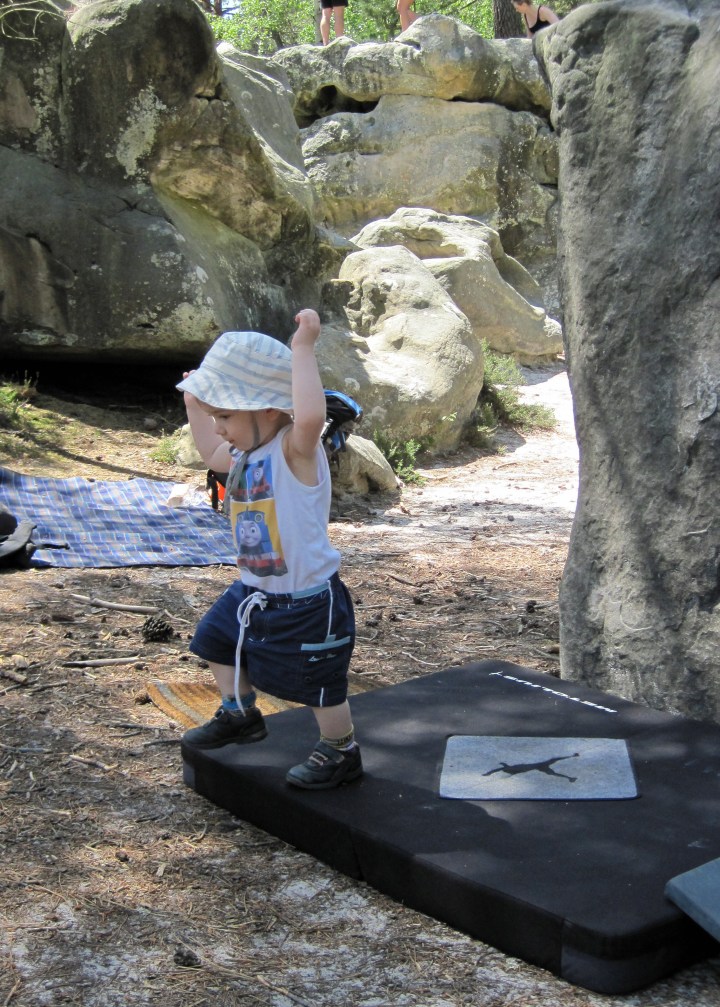 Leo enjoying jumping off our bouldering mat.