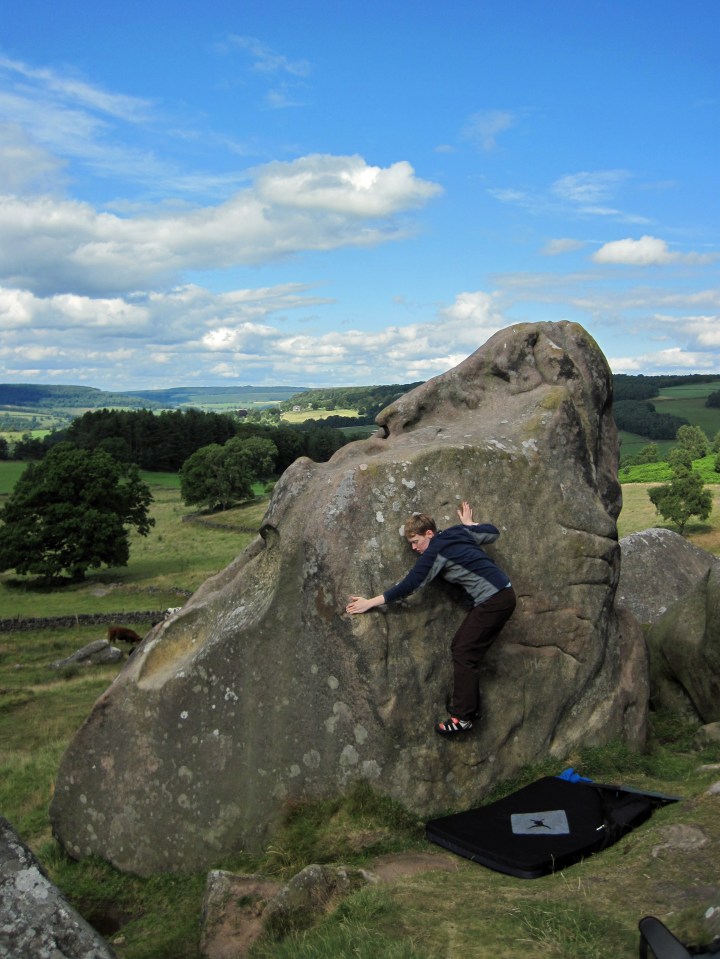 Valerie climbing JT (V0- 4b) at Robin Hood's Stride.