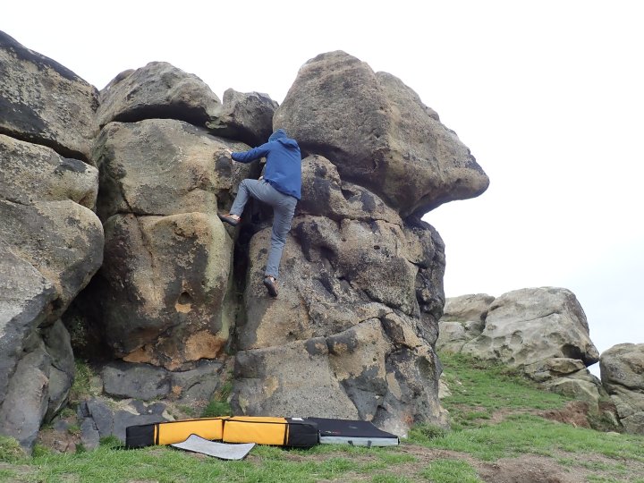 Climbing the problem Right Chimney at Little Almscliff.