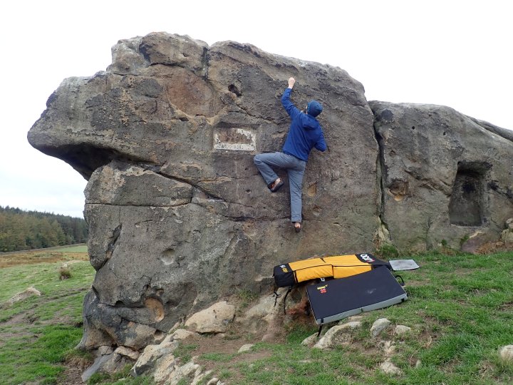 Climbing the problem Big Polished Pockets (4) at Little Almscliff.